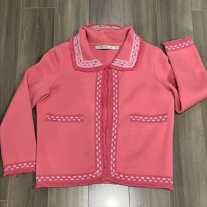 Pink luxury jacket with ruffles & beads deco.